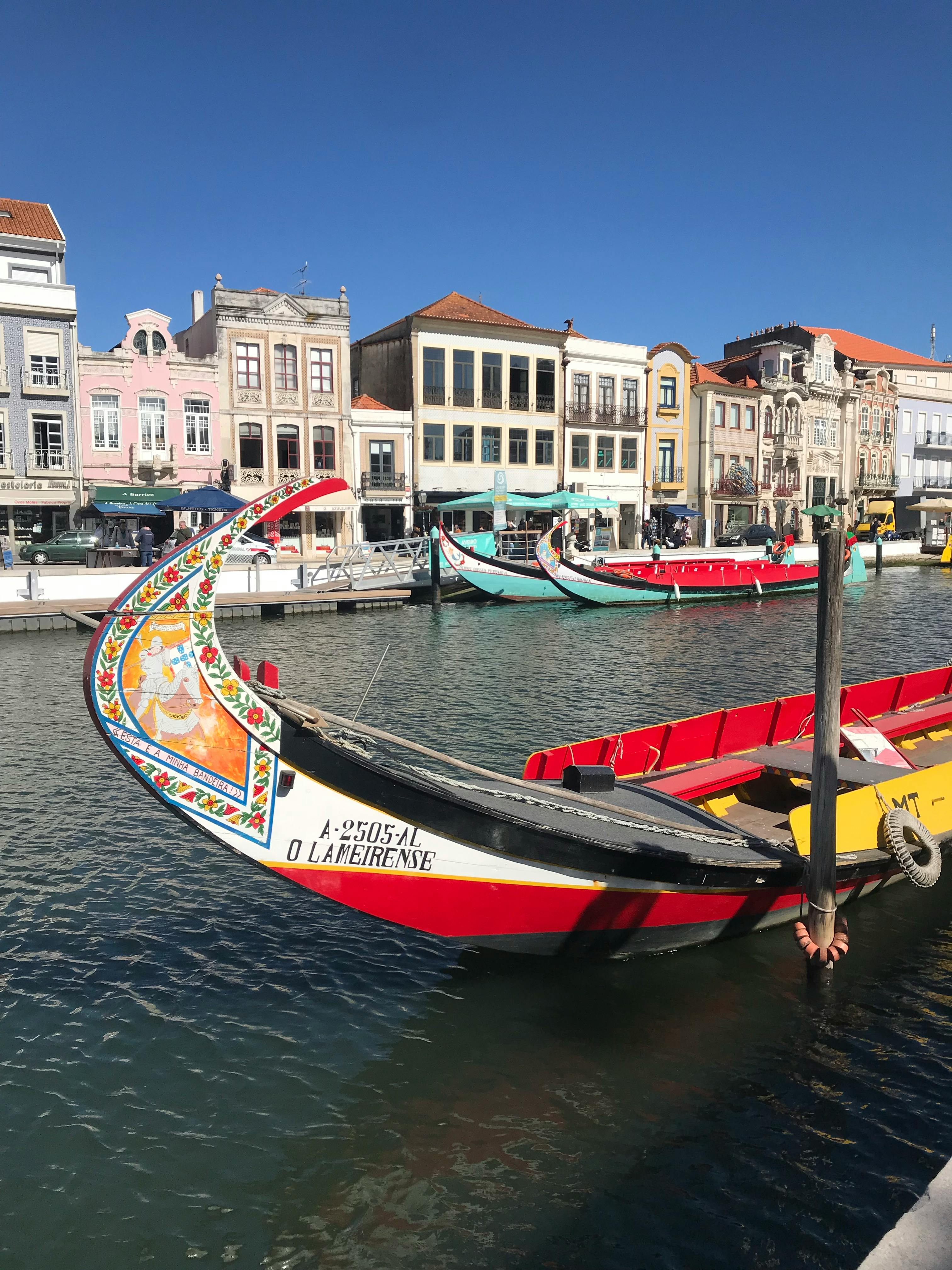 Colorful moliceiro boats in Aveiro canal, Portugal
